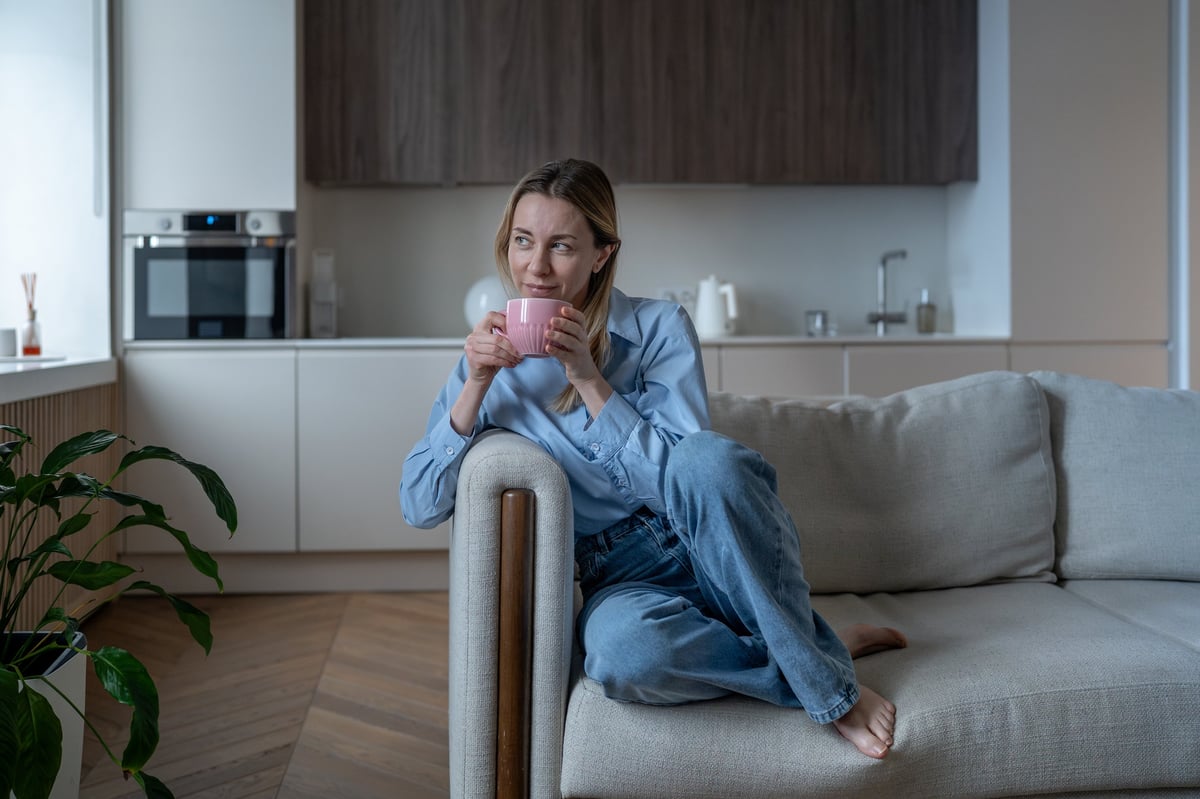 Woman feeling confident at sunrise